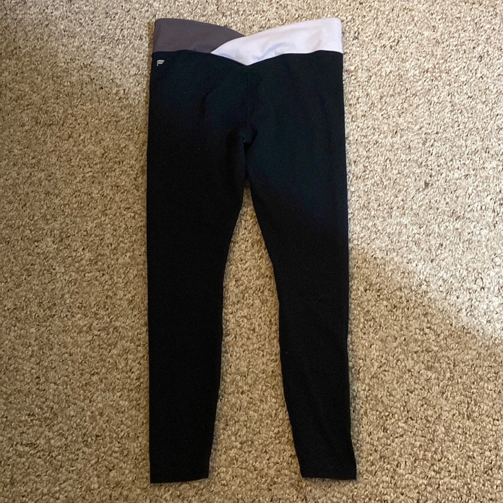 Black and purple cross waste Fabletics leggings